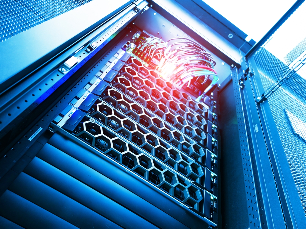 Data centres lie at the heart of the UK’s economic growth, particularly when it comes to AI. One way in which they’re changing is the way they’re built. Traditional data centres, which are often built from the ground up, are more frequently being replaced by faster, more flexible alternatives: pre fabricated data centres. Also known as modular data centres, these facilities are reshaping the way data centres are designed, how they’re deployed and operated. This blog explores their benefits and why more organisations are making the switch. How Do They Work? Pre fabricated data centres are self-contained, factory-built designs. They are fully assembled and tested before being transported to the final site. Unlike traditional data centres that require extensive on-site construction, they arrive ready to install. Each module includes all the necessary infrastructure: racks, cooling systems, power distribution, fire suppression and network connectivity. All are housed in a steel structure. These modules can work independently or be connected to form a larger facility, so you can easily expand when needed. The approach is often likened to LEGO-style construction. Rather than building everything at once, you install what you need when you need it. Key Components of Modular Data Centres The typical system includes: An IT Module which houses servers, storage, and networking equipment. This is the core of the data centre, where the actual computing happens. Power module which contains UPS (uninterruptible power supplies), switchgear, batteries, and generators. This ensures clean and continuous power supply. Cooling module that manages thermal loads with systems like in-row cooling, air handlers or liquid cooling depending on the requirements. Management & security module. Includes monitoring tools, access control, fire suppression, and physical security systems. Structural enclosure, which ruggedised for outdoor or indoor use. It should be built to comply with standards for weatherproofing, seismic activity, and electromagnetic interference. All of these are pre-engineered in a controlled factory environment, ensuring every part is of consistent quality. Why Shift from Traditional to Pre Fabricated Builds? Organisations are increasingly choosing pre fabricated data centres over traditional builds for several key reasons: 1. Speed of Installation Traditional data centres can take 12–24 months to complete. However, modular data centres can be deployed in as little as 12–16 weeks. In industries where time to market is critical (such as cloud services, finance, and telecoms) this is a major advantage. 2. Ideal for Growth Prefabricated designs allow for incremental growth. Your business can start small and expand capacity as needed without overcommitting. 3. Predictable Costs Factory-built systems reduce on-site labour and delays due to bad weather, so it’s much easier to stay on-budget. You get a clearer idea into total cost of ownership (TCO) from the outset. 4. Consistency and Quality Controlled manufacturing environments ensure consistent build quality and compliance with standards, reducing the risk of defects or performance issues. 5. Energy Efficiency Newer modules are designed with energy optimisation in mind, integrating high-efficiency cooling systems and power distribution units to improve PUE (Power Usage Effectiveness). Applications Across Industries Pre fabricated data centres are suited to a wide range of industries and use cases: Cloud providers who need rapid global expansion with uniform design. Telecom companies who require edge data centres closer to end users, which reduce latency. Government and defence organisations seeking secure, often temporary or mobile solutions. Healthcare companies who require scalable and secure infrastructure for data compliance and patient management systems. Retail and logistics. Such data centres can support real-time analytics and IoT operations close to distribution centres. Their plug-and-play nature also makes them perfect for remote or harsh environments where traditional data centres are impractical or costly. Considerations for a Design Effective data centre design for prefabricated systems goes beyond simply shrinking a traditional facility into a box. Here are a few areas to consider: Site Assessment Even though modules are self-contained, site factors like connectivity, local climate, and power availability still matter. Ensure there's proper access and infrastructure. Redundancy and Resilience Modular systems can be designed with N+1 or 2N redundancy, depending on uptime requirements. Consider the fault tolerance needed for your operations. Integration with Existing Infrastructure When expanding or hybridising with legacy systems, compatibility becomes critical. Make sure your modular units can integrate with existing monitoring and management platforms. Security and Compliance Pre fabricated data centres must meet the same security and regulatory standards as traditional builds. It’s therefore important to look for vendors offering ISO, HIPAA, or Tier certifications. Customisation vs Standardisation While modular builds are based on standard designs, many providers offer a degree of customisation, such as insulation for a particular climate. They can do this without sacrificing speed. The Future of Prefabricated Designs As data continues to proliferate and edge computing becomes more critical, the role of these types of data centres will only expand. Pre fabricated systems offer a compelling blend of flexibility, cost control, and performance. Source UPS is able to provide maintenance and accessories for all types of data centres, including prefabricated designs. For more information on modular data centres, don’t hesitate to contact our team at Source UPS.